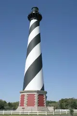 Cape Hatteras Light Conical, white and black spiral bands with red brick base.