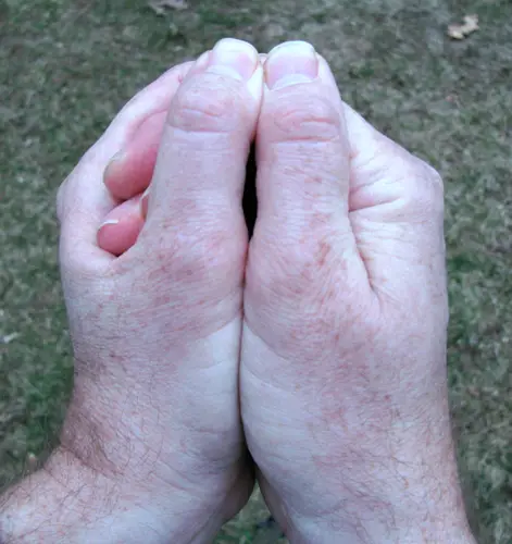 ...wrap the left hand around the right...