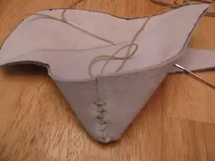 Stitch up the back.