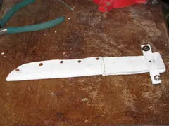 Rivet the sheath closed