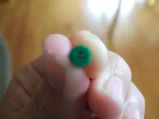 4. Now, slip the tight circle off the quilling wand and... voila!! You have made a tight circle.